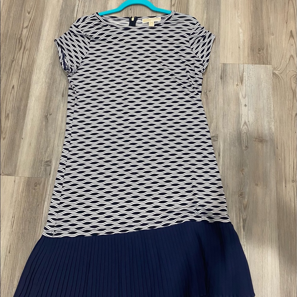Michael Kors dress with pleated detail and flattering pattern, size medium.
